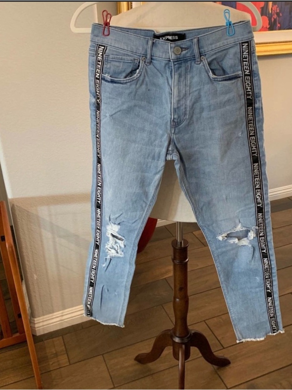 Express nineteen eighty‎ stripe light blue distressed jeans. Size 4